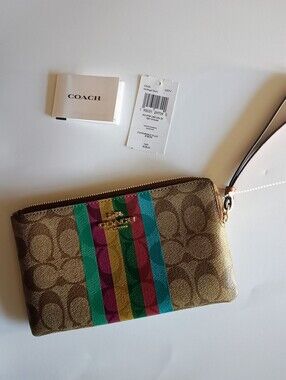 COACH Signature Canvas Wristlet in Brown